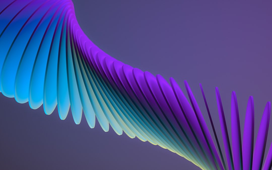 Abstract flowing shape in purple, blue, and teal gradient